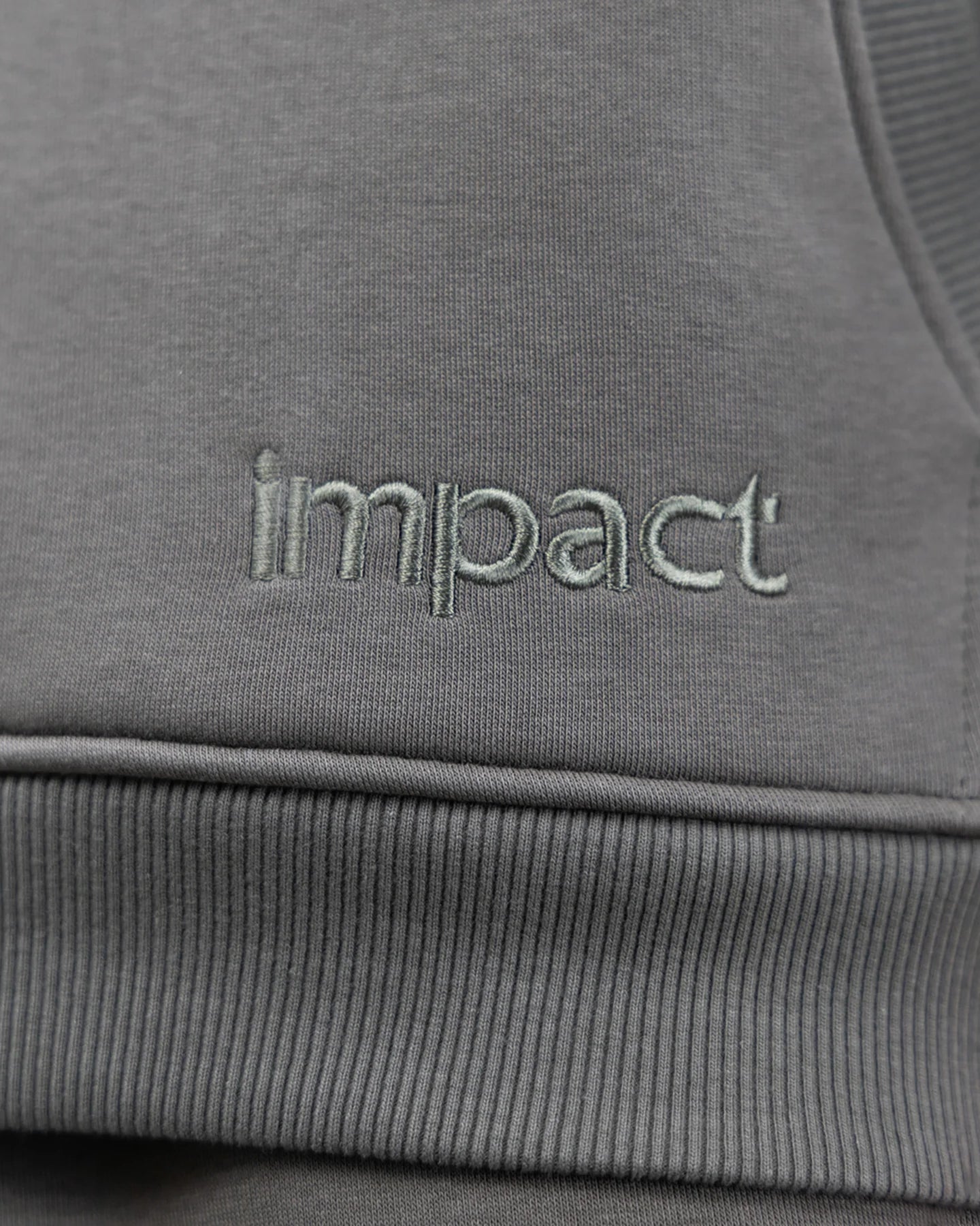 Impact Logo on the Hoodie