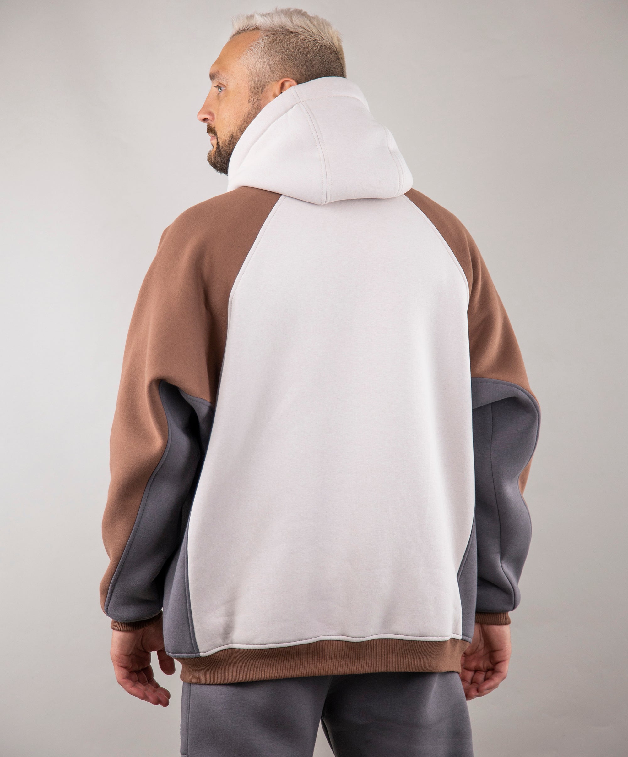 Cappuccino Vyshyvanka: Rich cappuccino-colored Hoodie. Man from the Back.