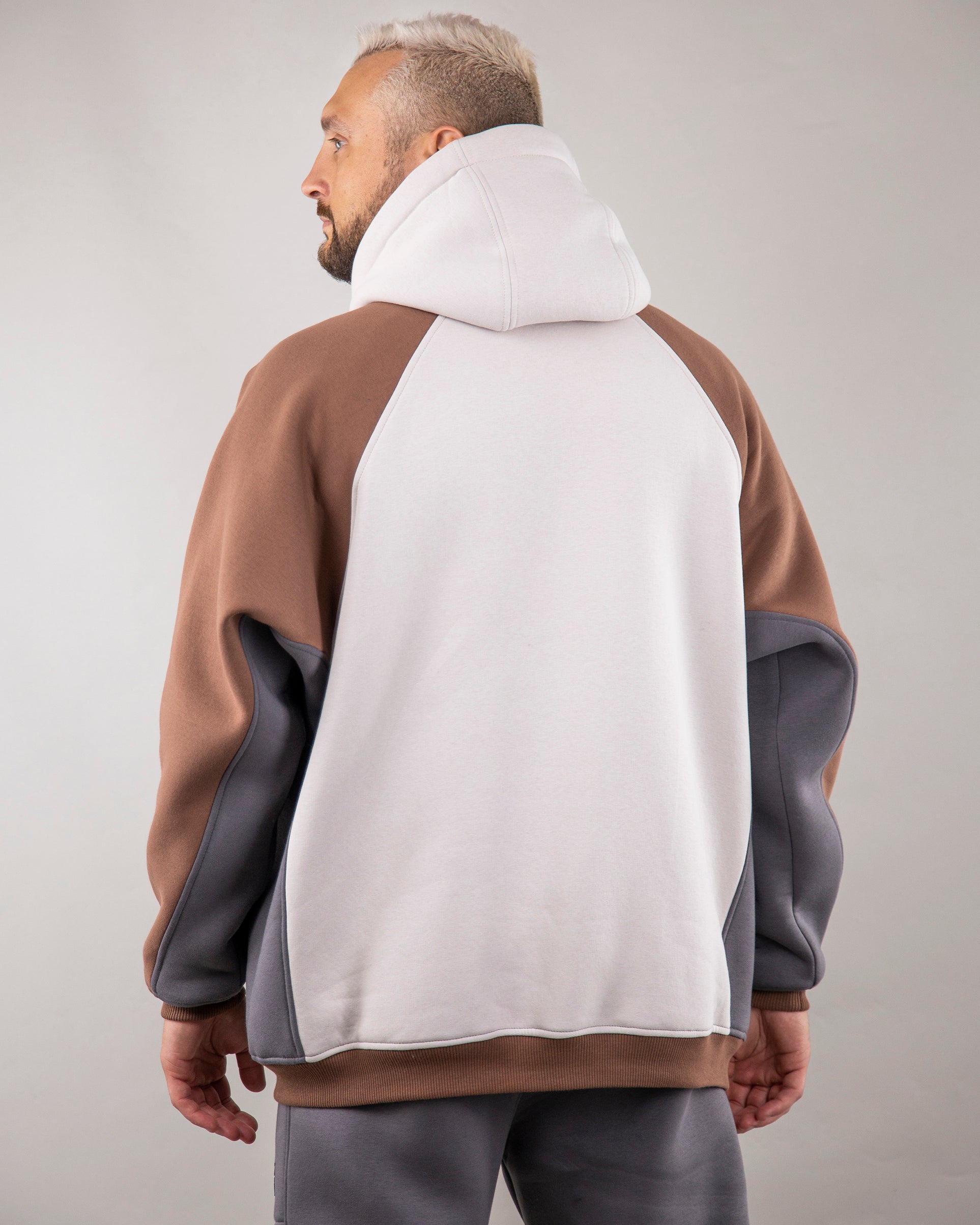 Cappuccino Vyshyvanka: Rich cappuccino-colored Hoodie. Man from the Back.