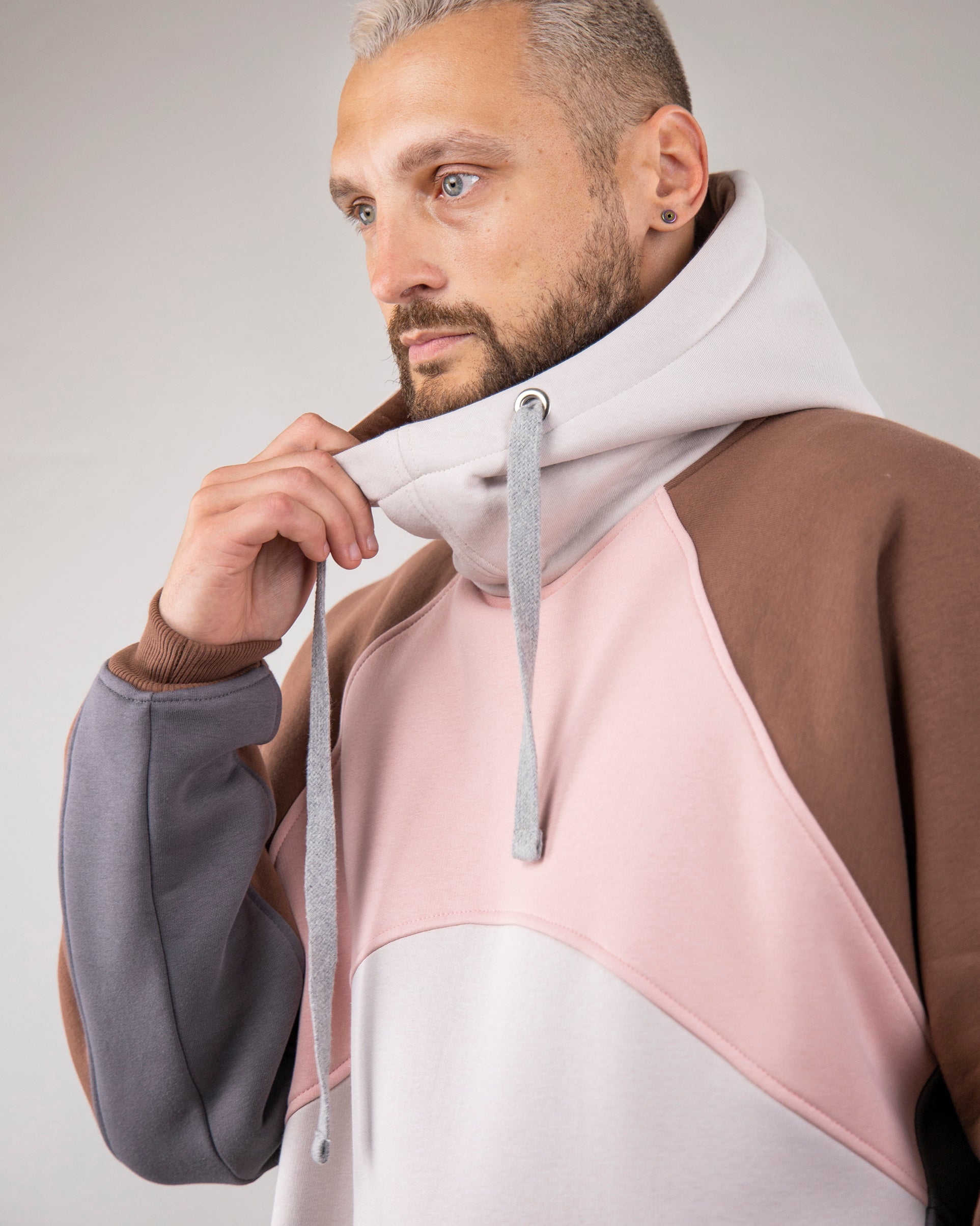 Hoodie "Umka", warm oversize hoodie. Pink/Cream/Brown. Man in front.