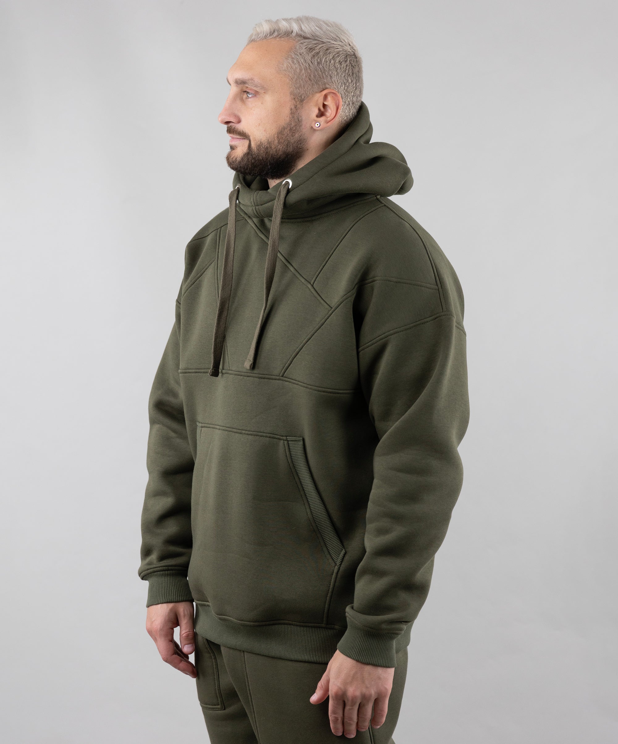 Warm Oversize Hoodie "Introvert". Khaki. Man in front